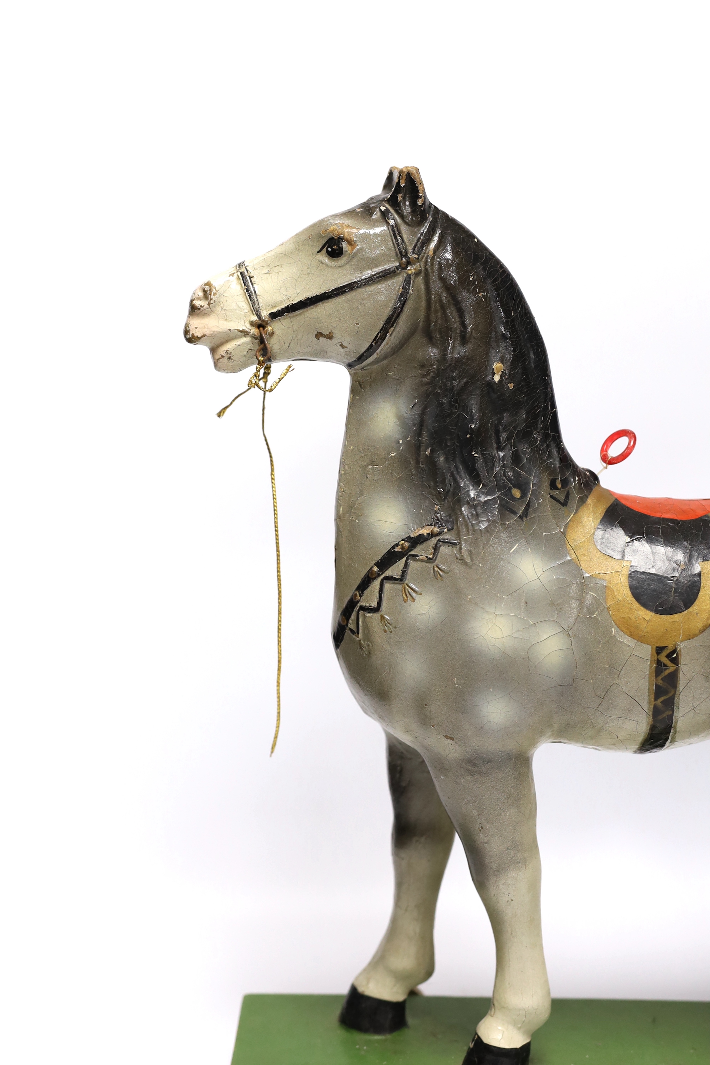 A push along vintage toy horse with pull-string soundbox, 47cm high